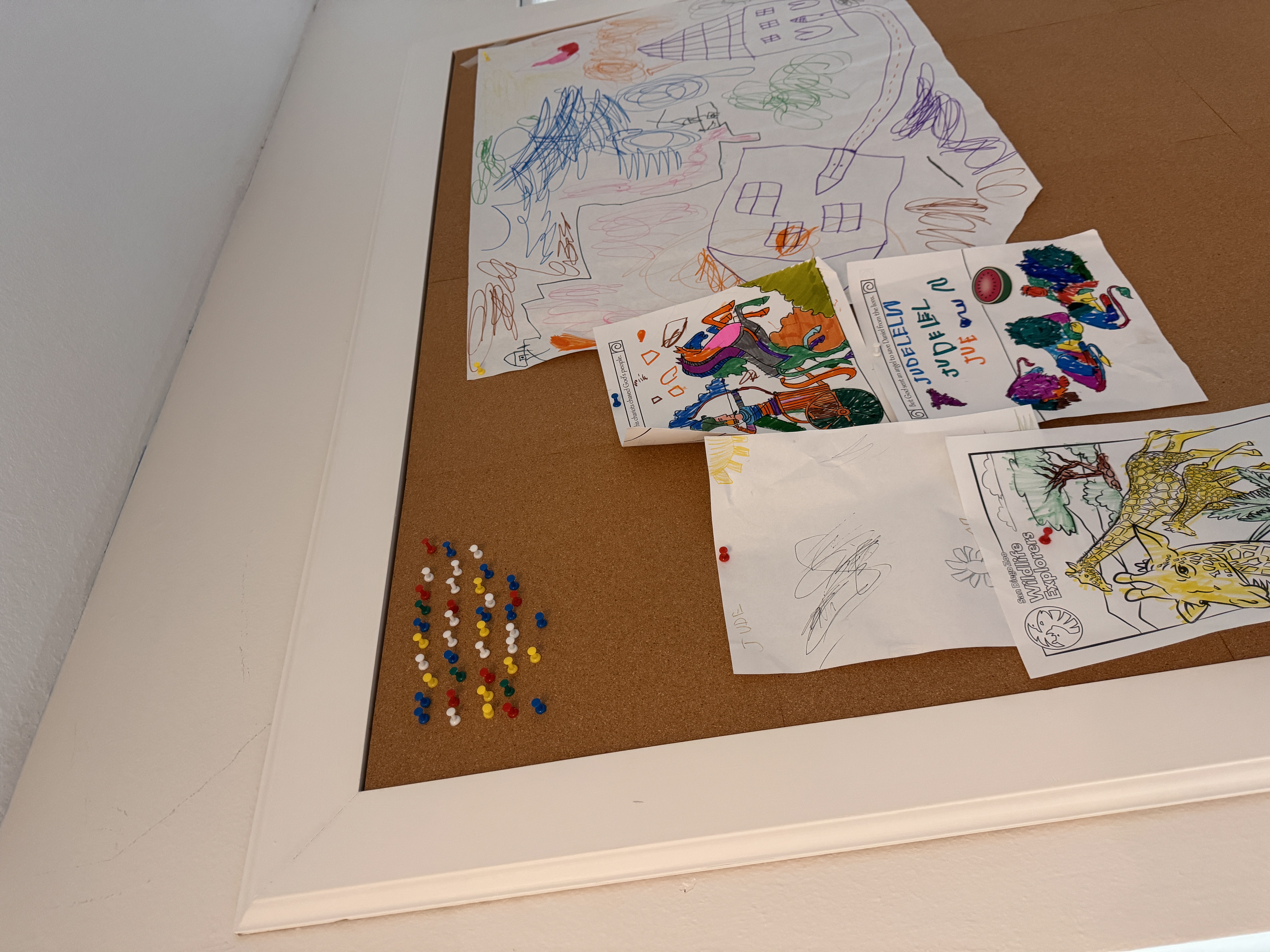 Top-down view showing the natural cork surface and painted white frame