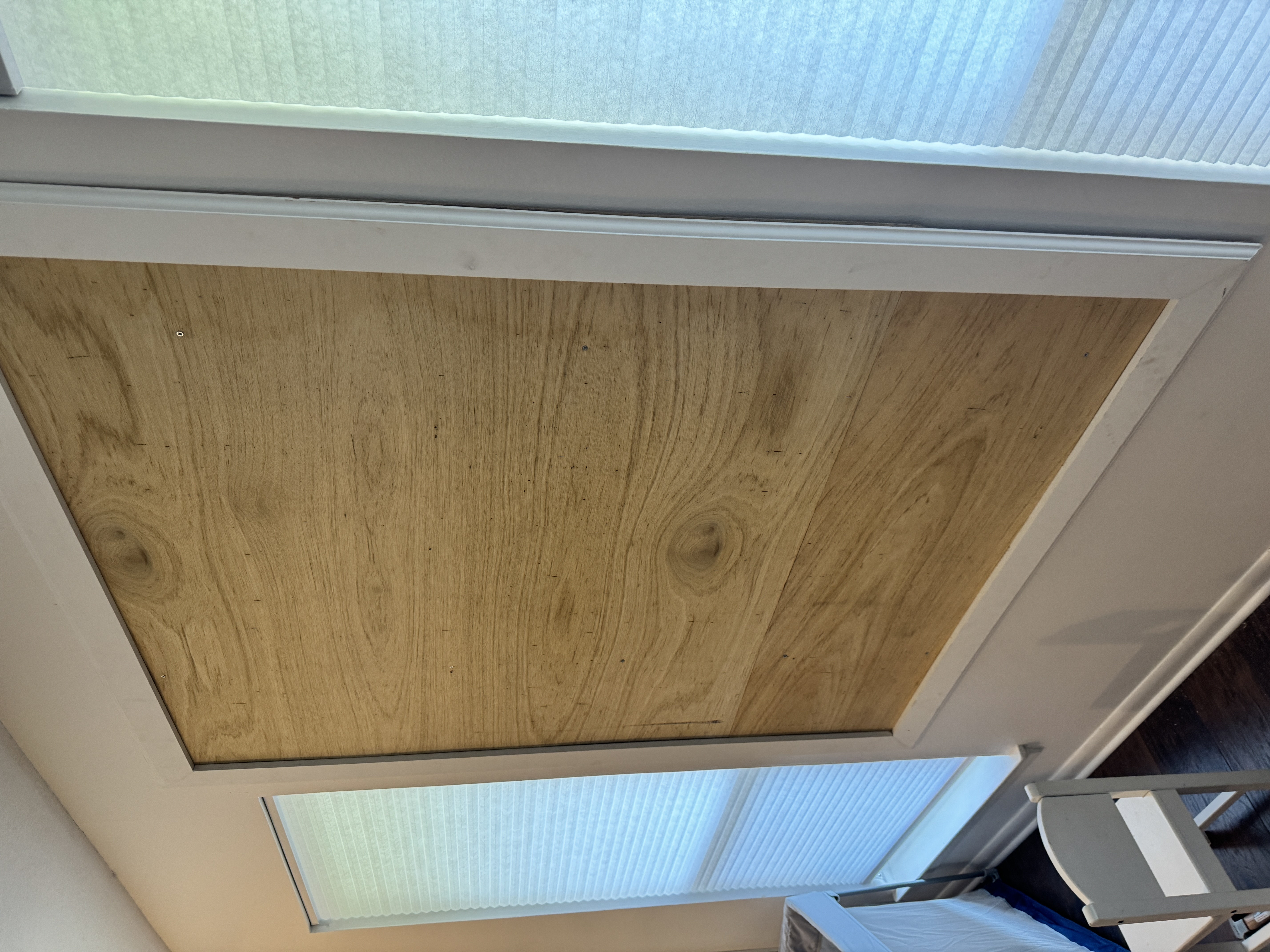 Lauan plywood backer cut to size with pine frame fitted around it